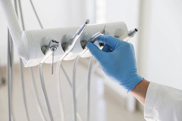 Professional Tooth Extraction technician working in Santa Ana, CA